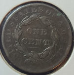 Close-up of a U.S. one-cent coin with 'Liberty' and 'One Cent' inscriptions.