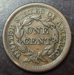 Vintage American penny on a dark surface