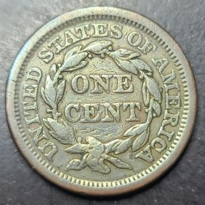 Vintage U.S. one cent coin on a dark background