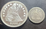 Two silver coins with a person profile on a dark background