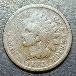 Vintage Indian Head cent coin from 1865 on a dark background