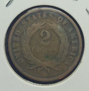 Two-cent piece coin from the United States on a white background