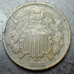 A close up of a 1866 2 cent piece 