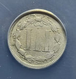 coin with a central design on a blue background