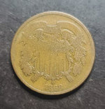Close up of an 1868 2 cent piece obverse 