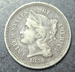 Close up of a 1874 3 cent nickel 