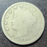 A close up of an 1884 liberty nickel 
