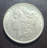 Close up view of the obverse of a 1890 Morgan dollar 