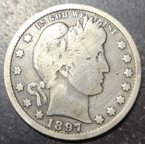 Close up view of a 1897 barber quarter 