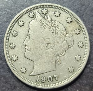 A close up of a 1907 liberty nickel 