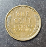 Vintage one cent coin from the United States on a dark surface