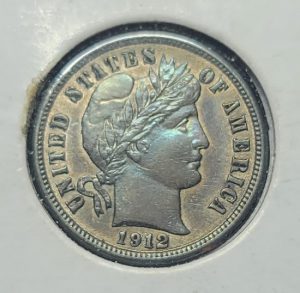 Silver coin with 'United States of America' inscription on a white background