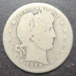 Silver coin with profile of a woman and 'In God We Trust' inscription, dated 1915.
