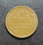one cent coin from the United States on a dark background