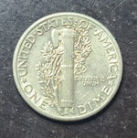 Silver dime coin with 'United States of America' and 'One Dime' text on a dark background