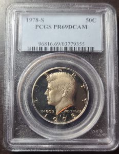 1978-S Kennedy Half Dollar in a protective holder with grading label.
