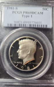 1981-S Kennedy Half Dollar in a protective holder with grading information.