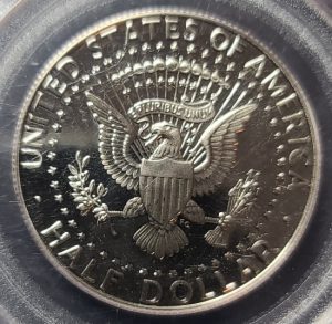 Close-up of a U.S. half dollar coin with an eagle emblem.
