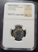 Ancient coin in a protective case with grading information