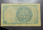 Old 25 cents banknote with decorative elements on a dark background